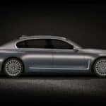 7 Series sedan in spotlight against black space