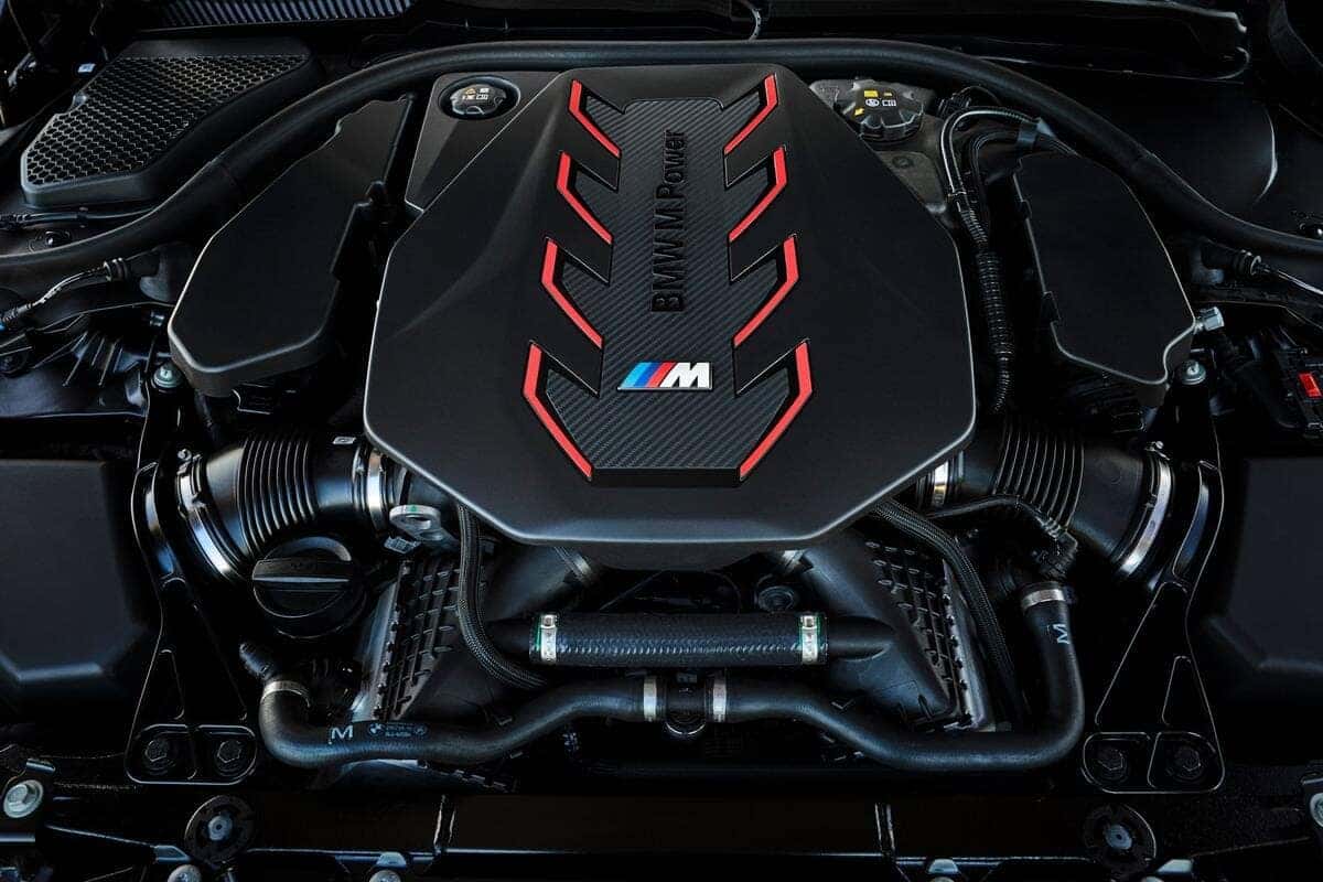 A close-up view of a BMW M5 Touring engine showcasing its intricate design and powerful components.