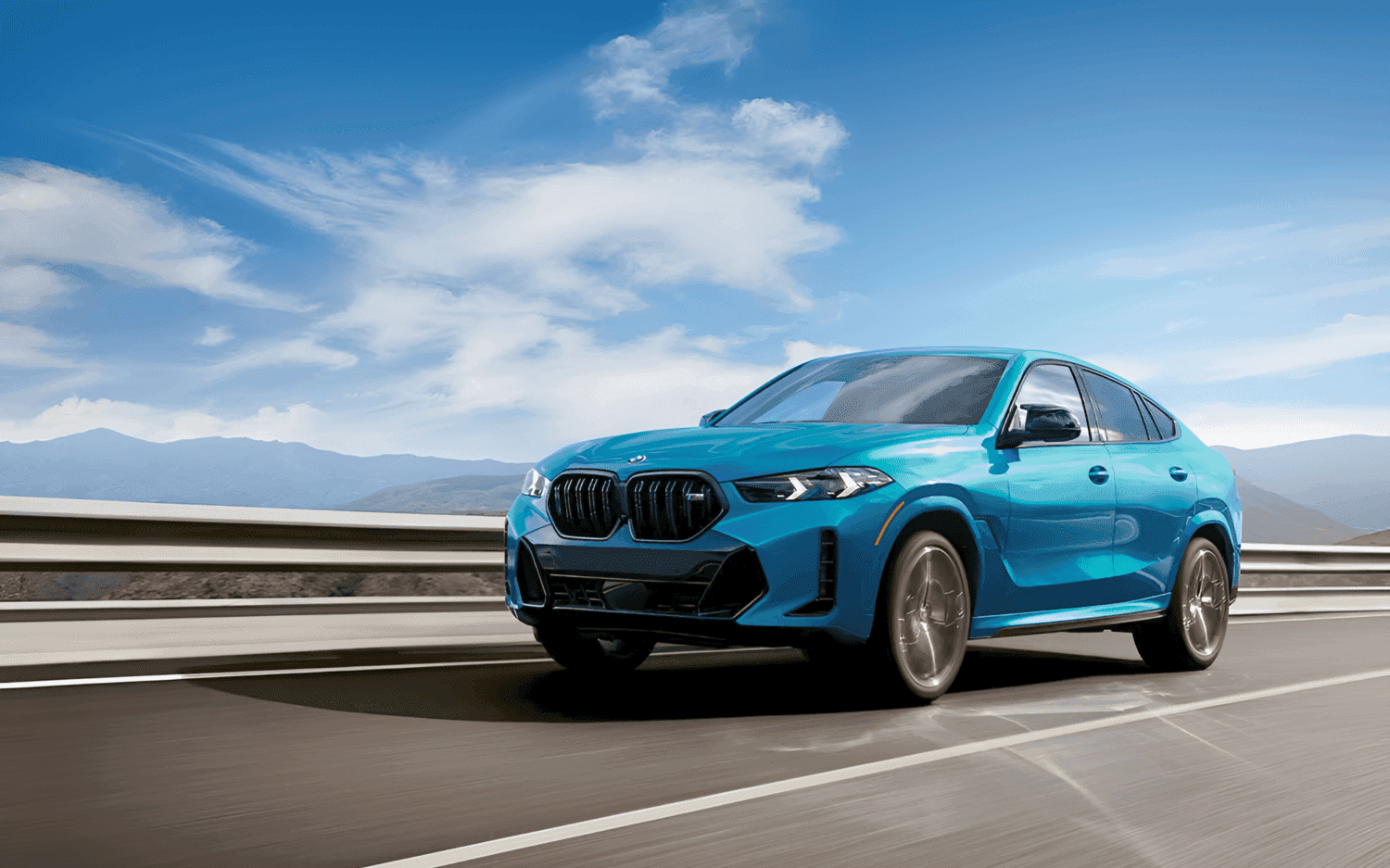 2025 BMW X6 SUV cruising down the highway