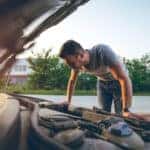 Beat the Heat: Keep Your Ride Cool and Running All Summer - Looking under car hood