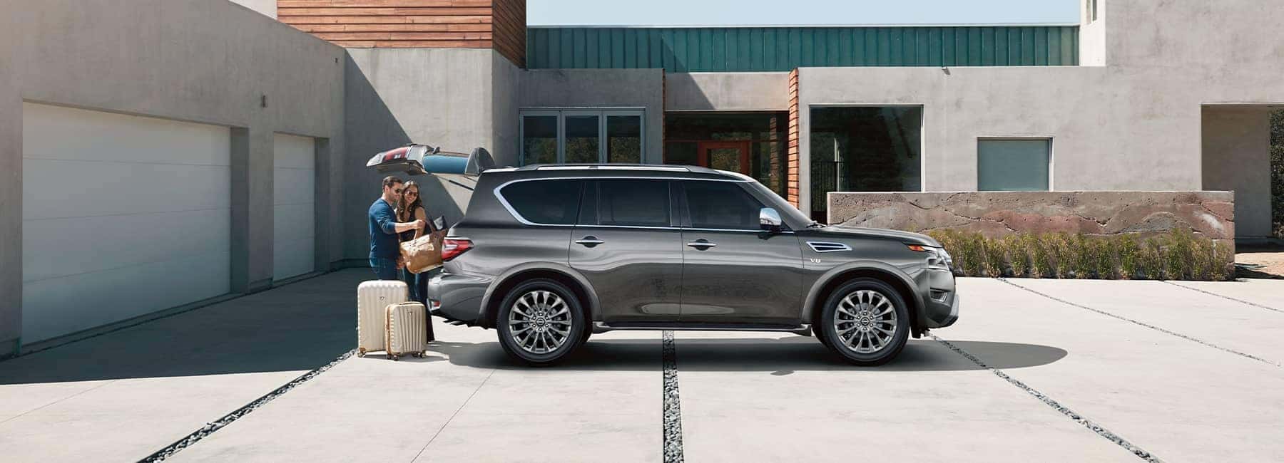 A 2021 Grey Nissan Armada parked in a driveway with the back open