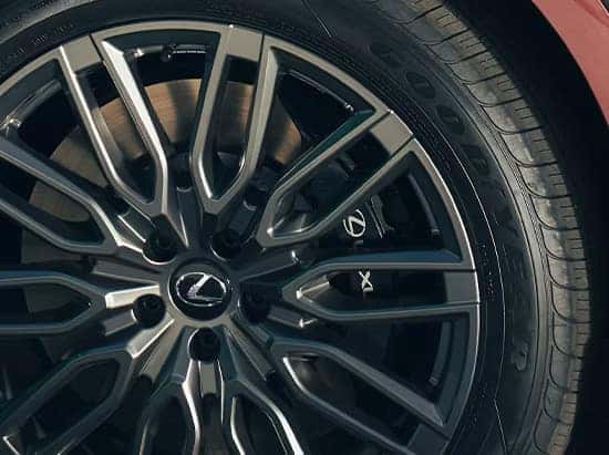A close-up of a Lexus RX alloy wheel with a stylish multi-spoke design and Lexus logo.