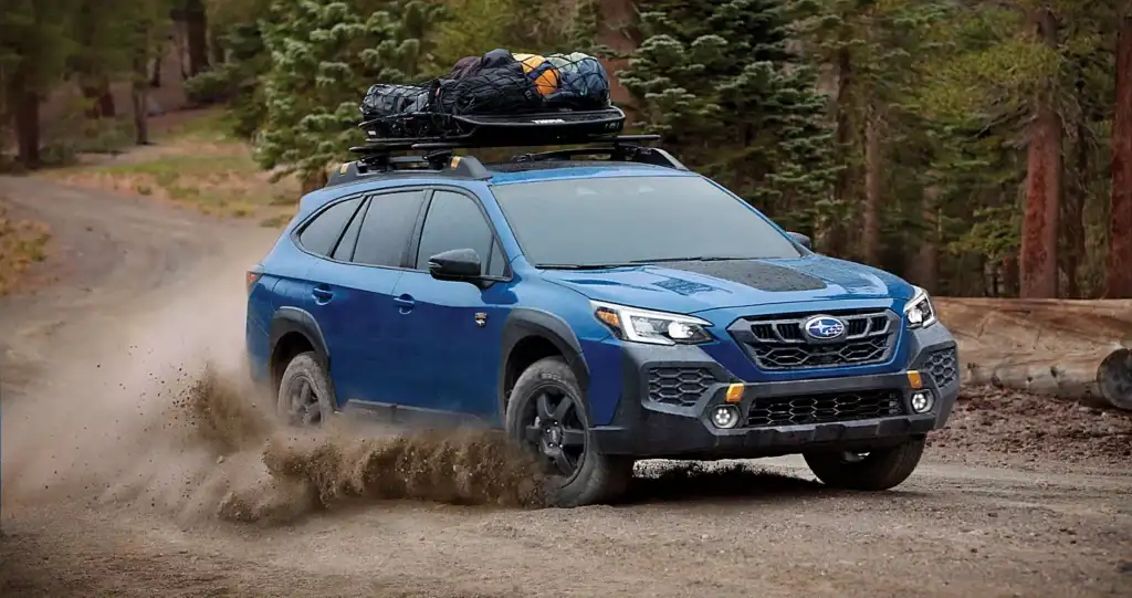 blue 2025 subaru outback off roading