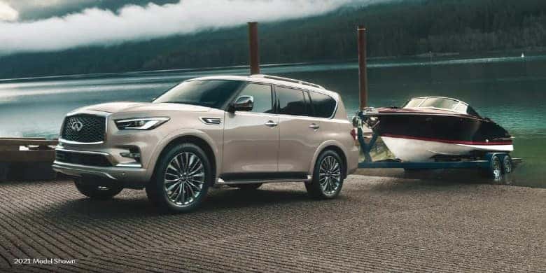 2023 INFINITI QX80 towing a boat