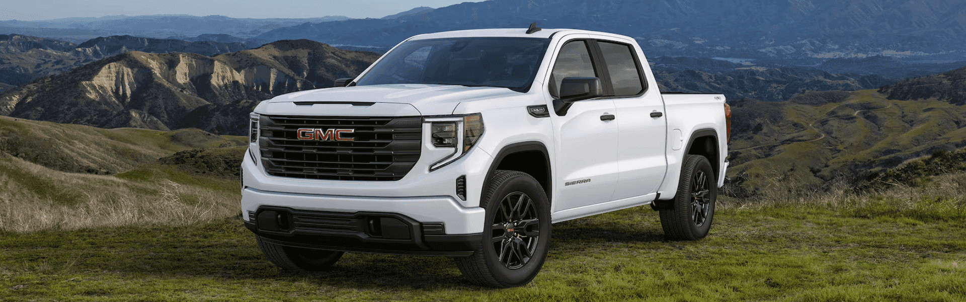 2024 GMC Sierra 1500 in white parking side view