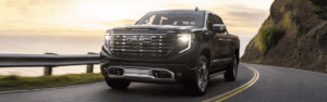 2024 GMC Sierra 1500 Denali in black running on street