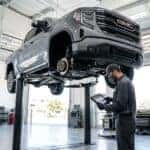 gmc sierra service center Austin tx truck on lift