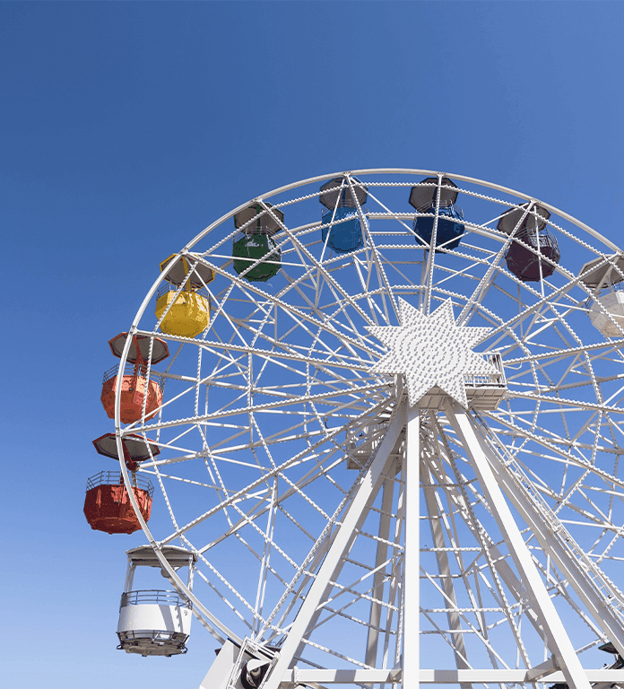 Toyota Dealer Near Clearfield | White color ferris wheel with colorful seat