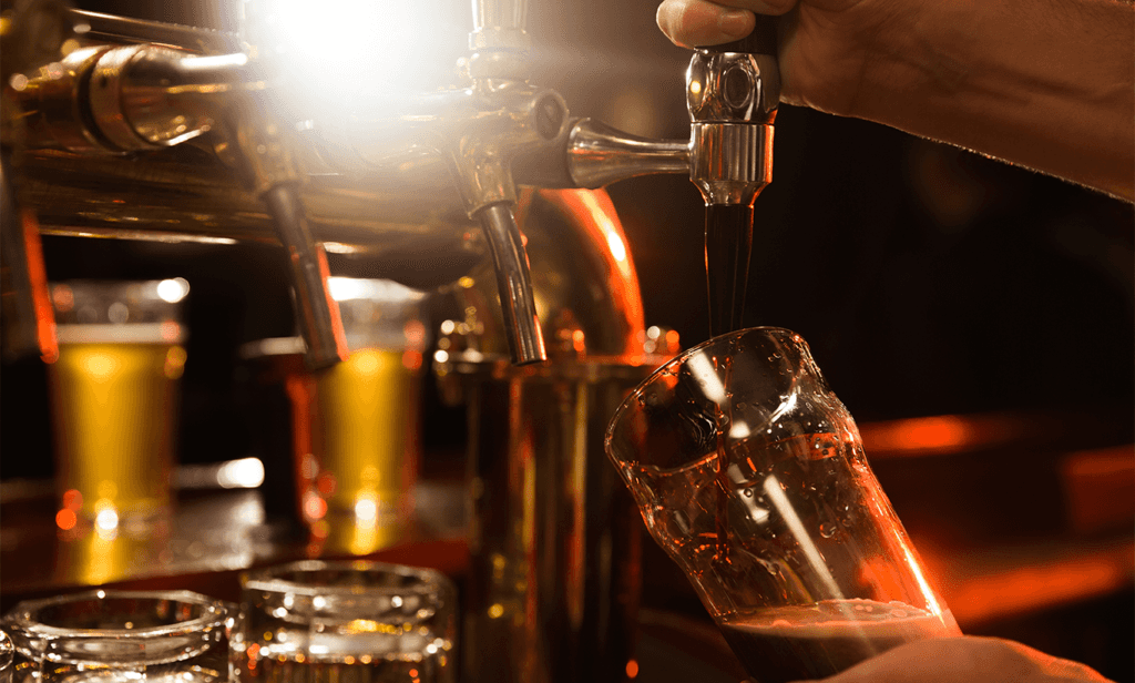 Toyota Dealer Near Clearfield | Person pouring a fresh cup of beer
