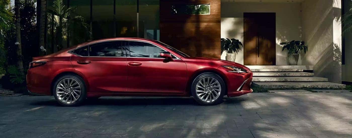 Red 2024 Lexus ES parked on a driveway