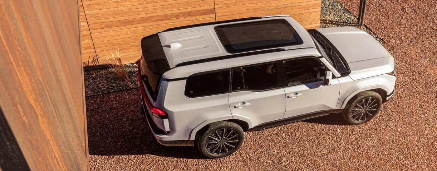 An off-white 2026 Lexus GX 550 Luxury+ parked.