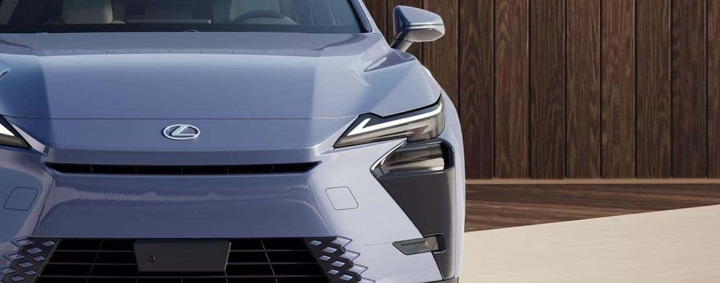 Front grille view of a blue 2026 Lexus ES 350h Premium.