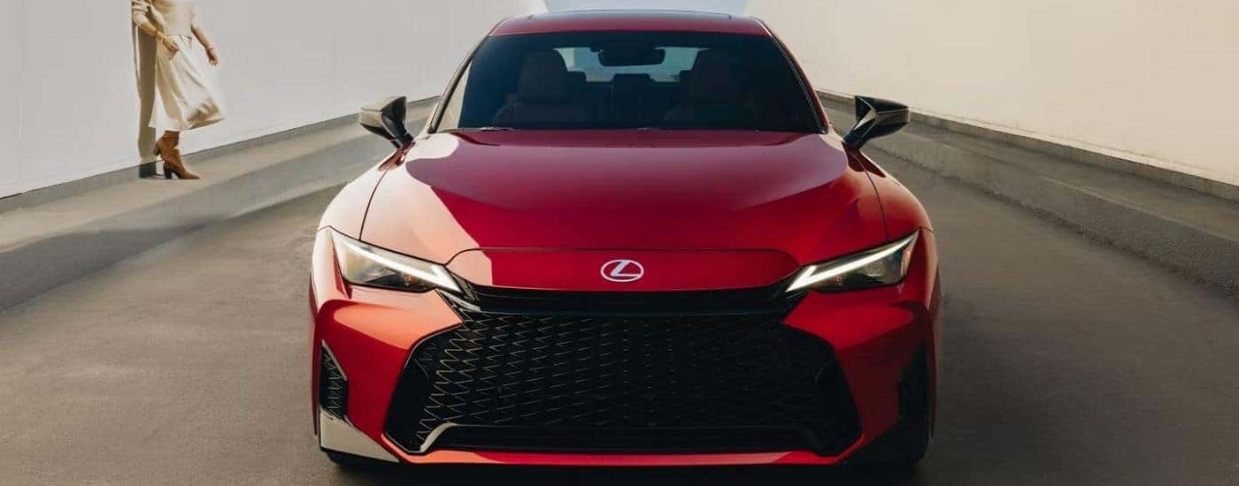 Front grille view of a red 2026 Lexus IS 350 F Sport.