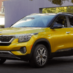 2021 kia seltos yellow exterior modle parked outside