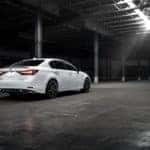White Lexus parked in warehouse
