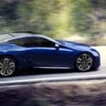2024 Lexus LC driving down a forest road