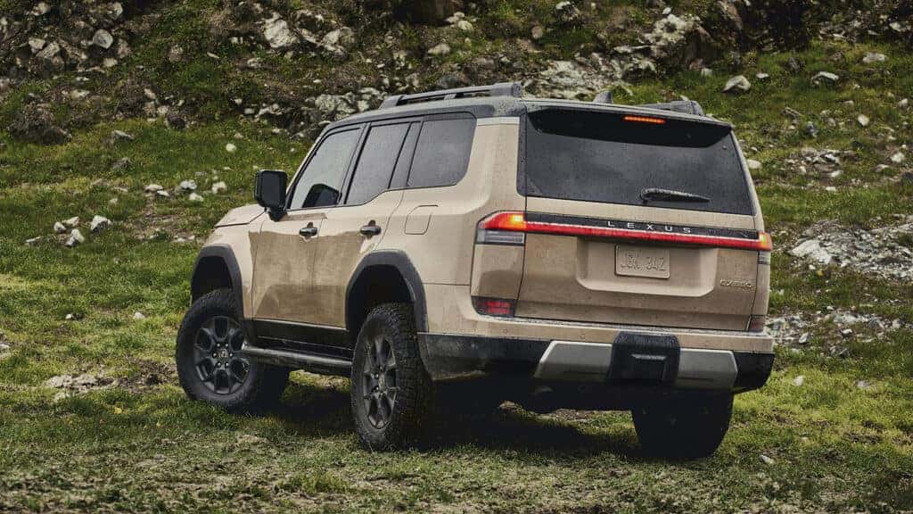 Upcoming 2024 Lexus GX Parked Rear 3/4 View in Front of a Mountain