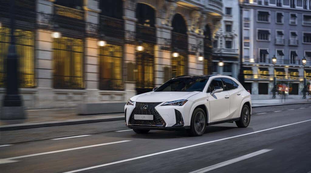 Lexus UX250 Hybrid Driving Through a Downtown City
