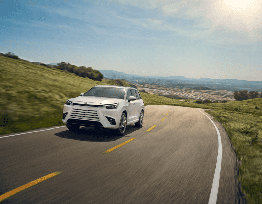 Lexus TX Driving on a Rural Road