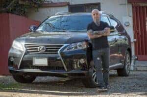 Scott Ian Standing with his Lexus RX