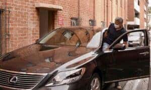 George Clooney Getting in his Lexus LS