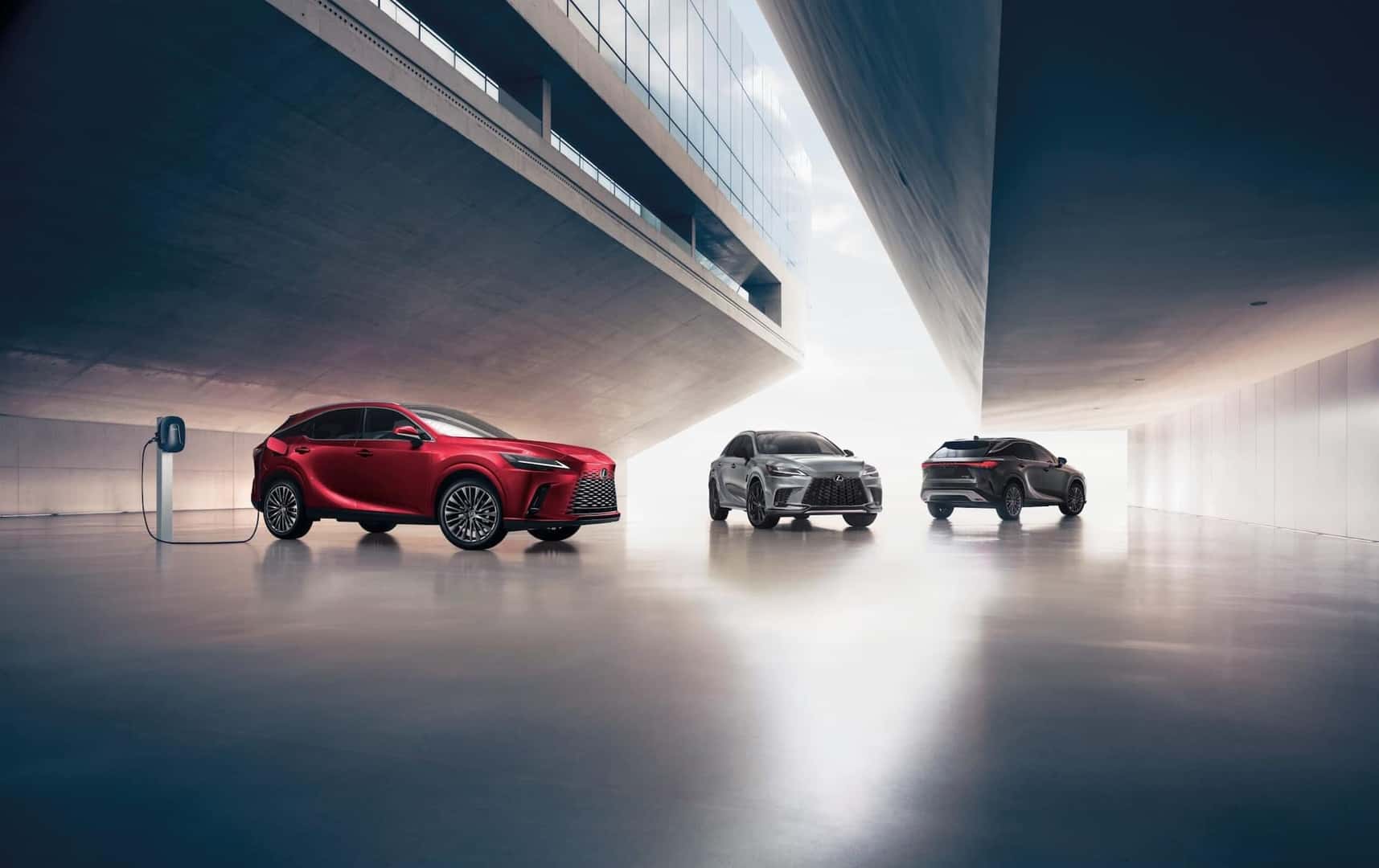 2024 LEXUS RX 450H+ Luxury at a charger