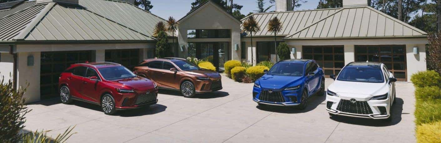 Four 2023 Lexus RX Models in a Driveway