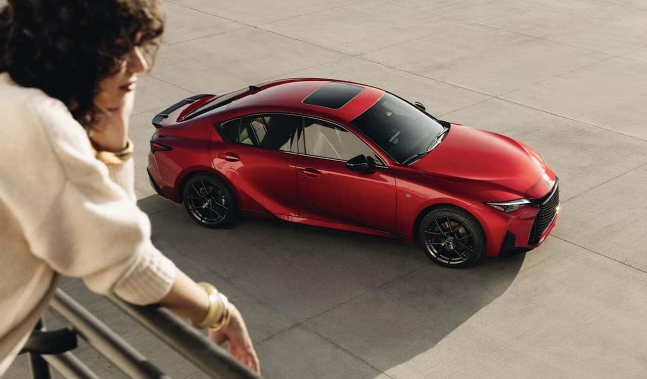 New 2026 Iridium Lexus IS driving in Metairie, LA