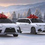 White Lexus models in the snow with red bows