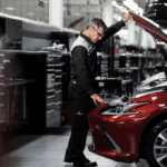 red Lexus being serviced