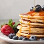 Pancakes with strawberries and blueberries for brunch