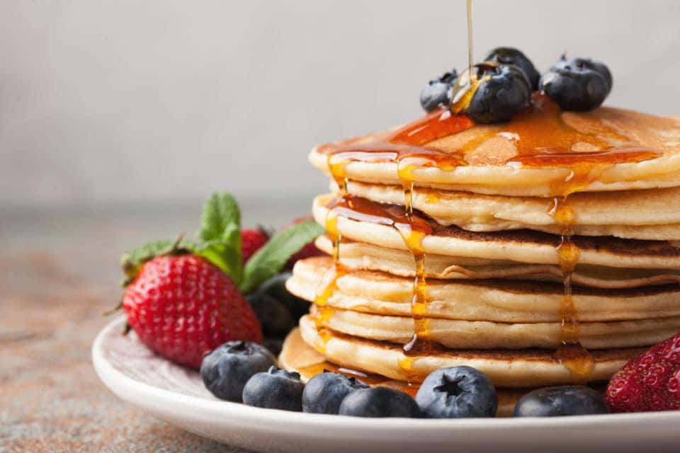 Pancakes with strawberries and blueberries for brunch