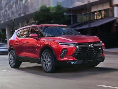 2024 Chevrolet Blazer driving fast down a city street