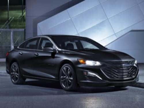 2023 Malibu Exterior 2024 Chevrolet Malibu Midnight Edition exterior view parked outside a modern building at night