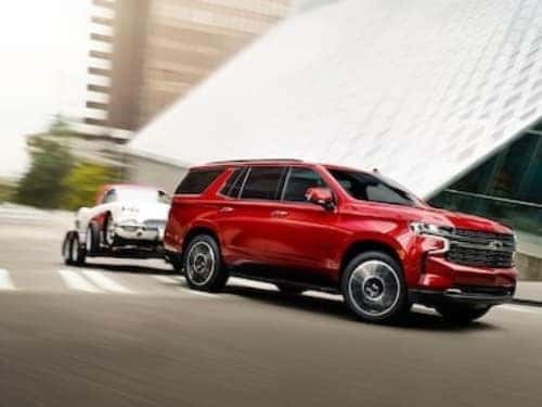 2024 Chevy Tahoe towing a small car