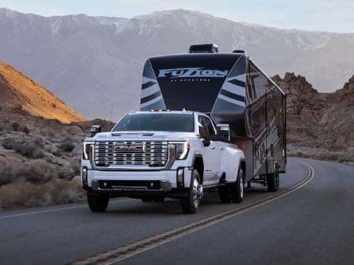 2025 GMC Sierra HD towing an RV