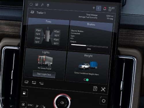 2025 GMC Yukon trailering app shown on touchscreen display