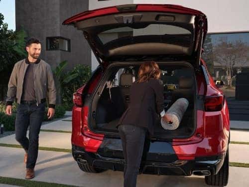 2025 Chevrolet Blazer view of couple loading things into cargo area