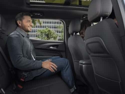 2025 Chevrolet Trailblazer view of man sitting in back seat