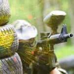 paintball player under gunfire