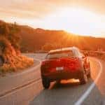 Mazda CX-30 on road at sunset