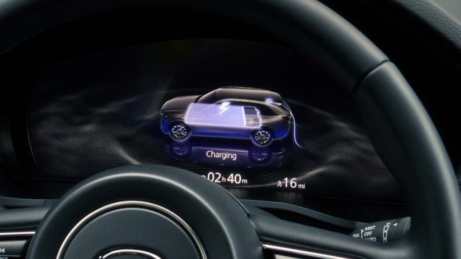 The dashboard of the 2026 Mazda CX-90 PHEV displaying charging info