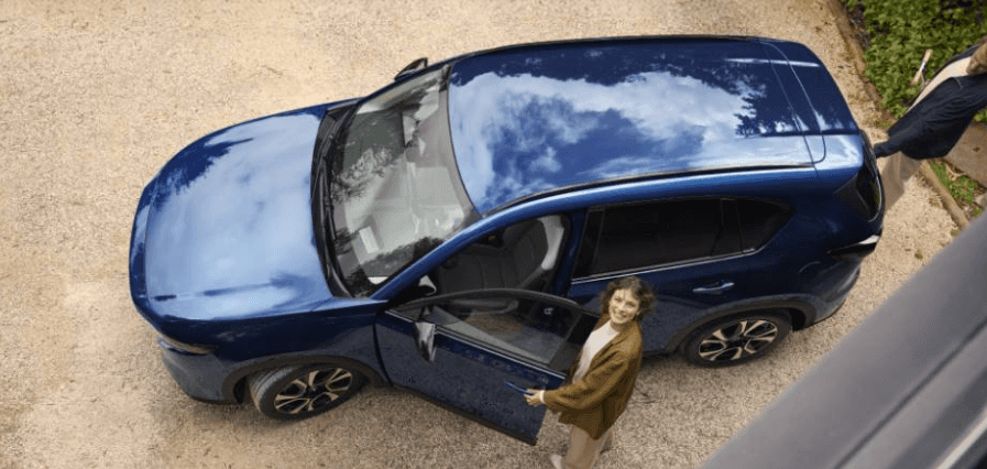 2026 Mazda CX-5 SUV overhead view in blue with driver door open at Med Center Mazda
