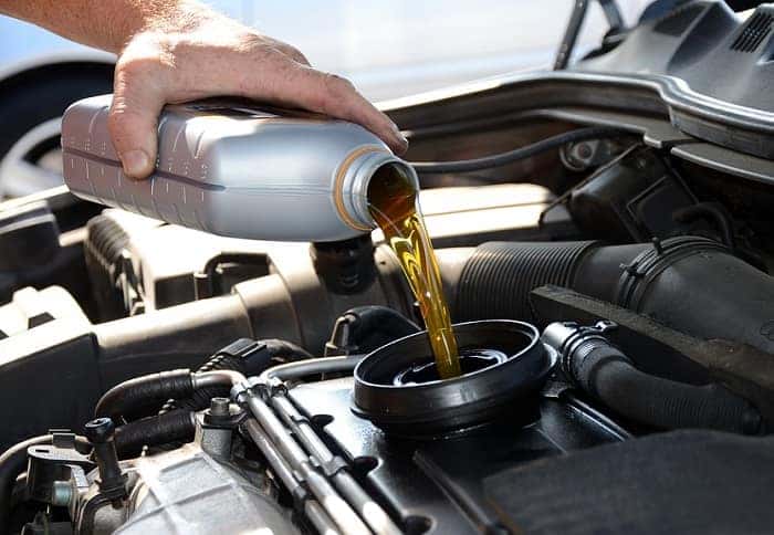 Adding oil to vehicle after a Mazda oil warning light comes on