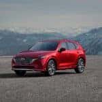 Mazda CX-5 lease vehicle parked against a mountainscape
