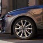 Wheel of a parked new Mazda sedan