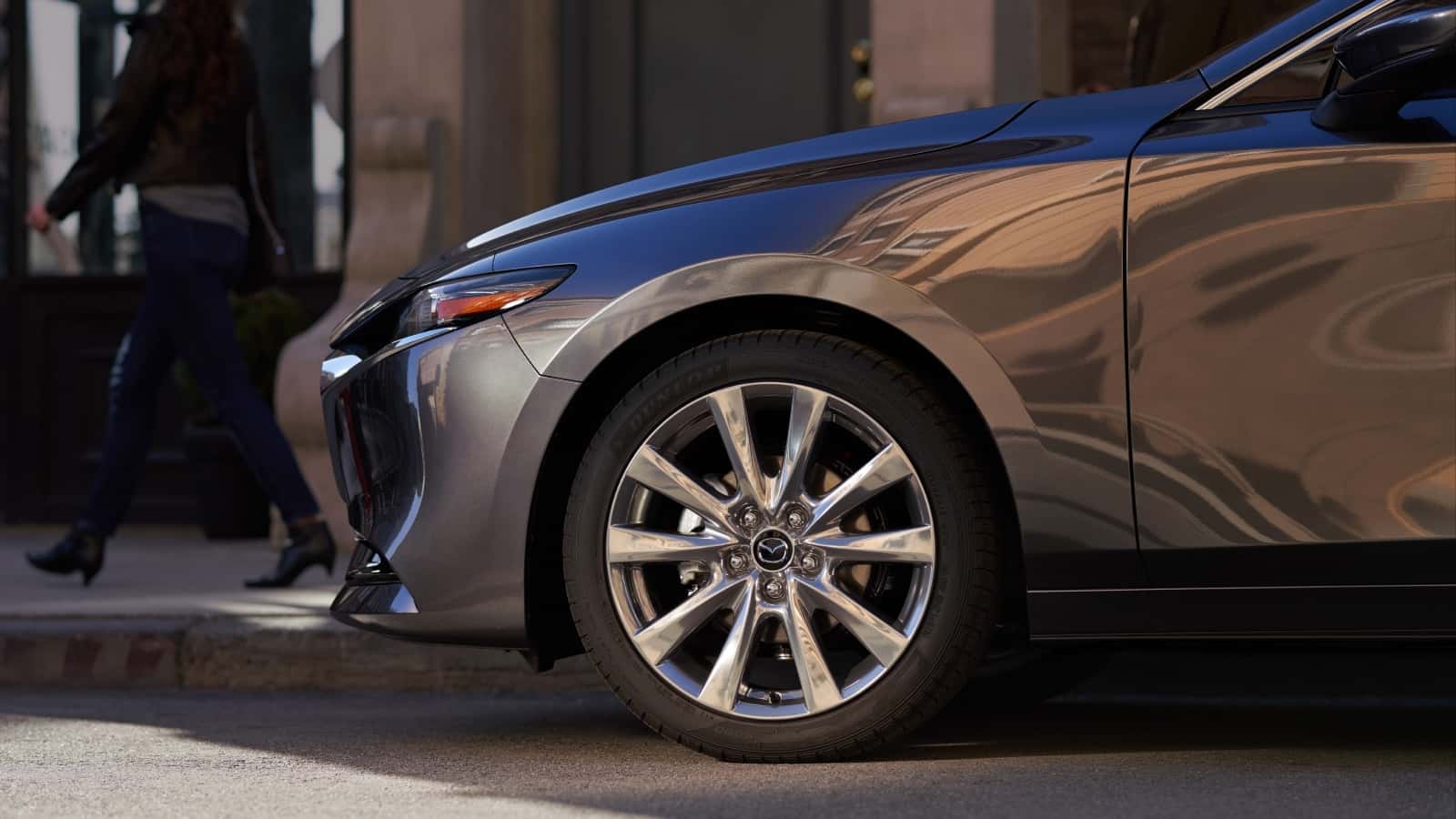 Wheel of a parked new Mazda sedan