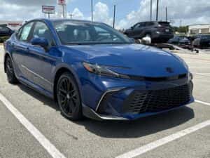 blue 2025 Toyota Camry in a parking lot
