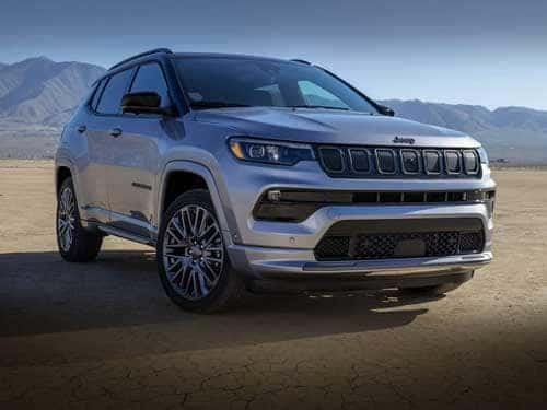 2023 Jeep Compass parked with mountains in the background