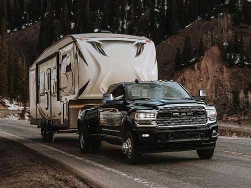 2023 RAM 3500 towing a camper